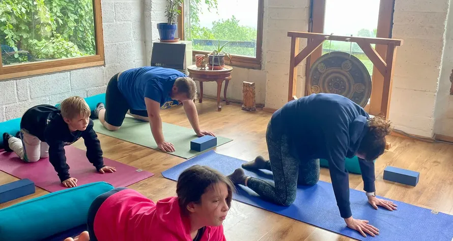 family yoga practice together